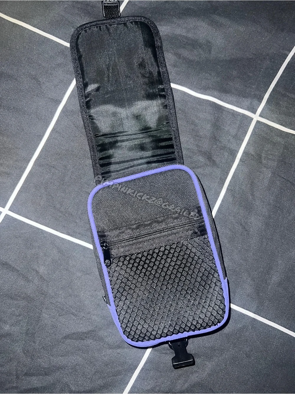 Black & purple Gameboy advance pouch with 2 pockets.